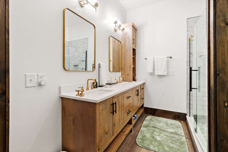 Master Bathroom with Dual Vanities and Step-In-Shower