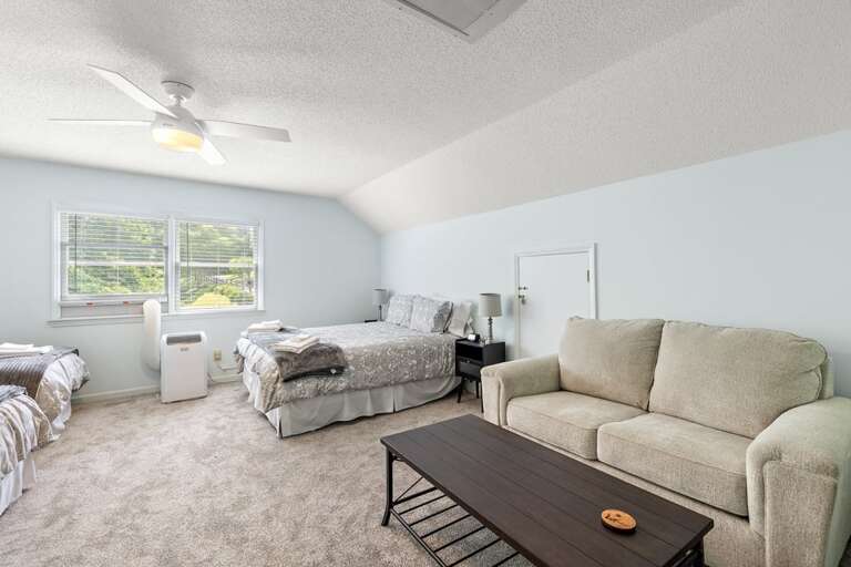 Upstairs Sleeping Area with a Sitting Area