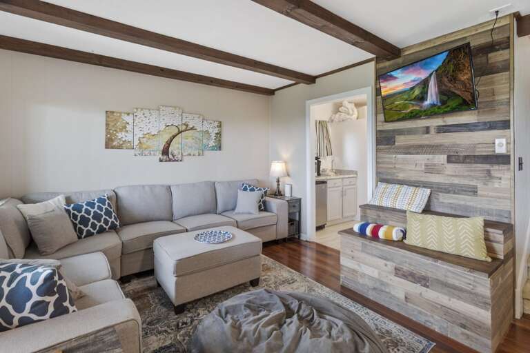 Middle Level Living Area with TV and Cozy Sectional Sofa Middle Level Living Area with TV and Cozy Sectional Sofa