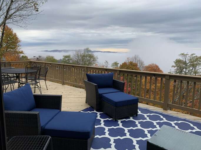 Lake-view Lounge With Seats And Serene Skies Lake-view Lounge With Seats And Serene Skies