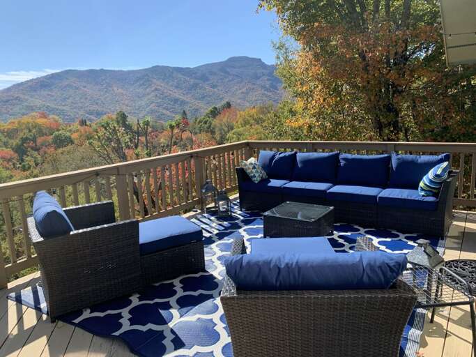 Balcony With Blue Couches Overlooking Vibrant Vista, Vacation Rental Balcony With Blue Couches Overlooking Vibrant Vista, Vacation Rental