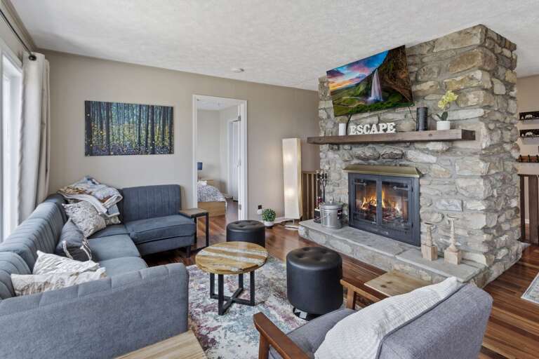 Wood Burning Stacked Stone Fireplace and Mounted Flat Screen TV Wood Burning Stacked Stone Fireplace and Mounted Flat Screen TV