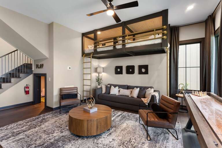 Two Suspended Twin Beds Over Queen Sleeper Sofa with Play Room Under the Stairs Two Suspended Twin Beds Over Queen Sleeper Sofa with Play Room Under the Stairs