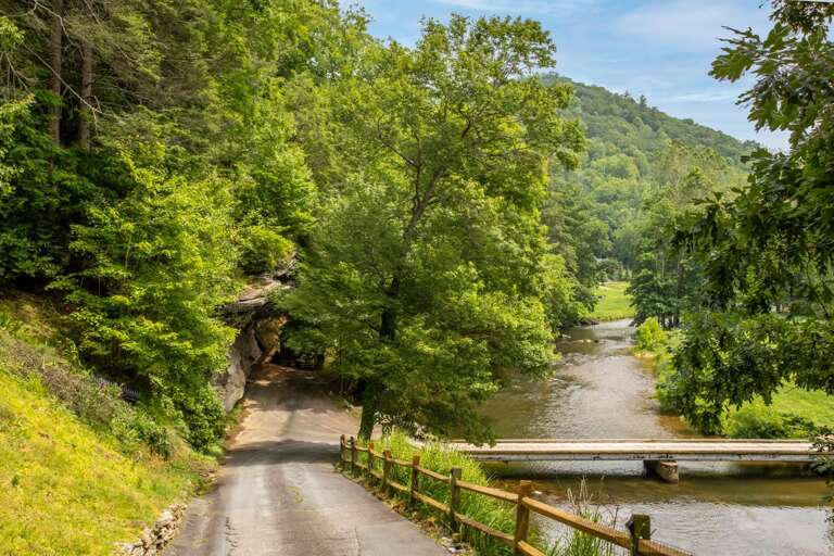 Access to the River is Down the Driveway by the Bridge
