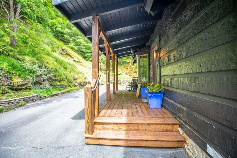 Covered Front Entrance and Paved Driveway