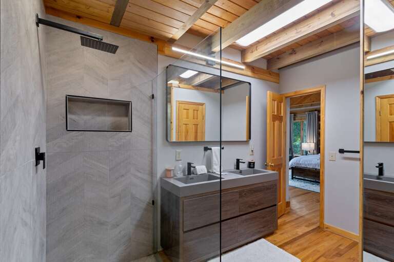 Frameless Glass and Tile Shower and Double Sink Vanity
