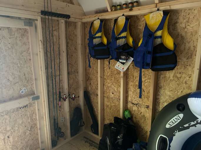 Kayaks, Floats and Plenty of Space for Storing Water Gear in the Shed by the River
