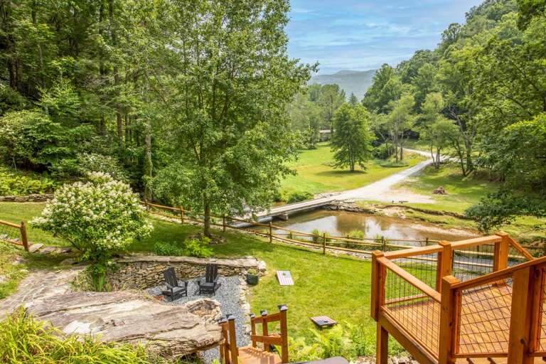 Main Floor Deck Overlooking the River and Fire Pit