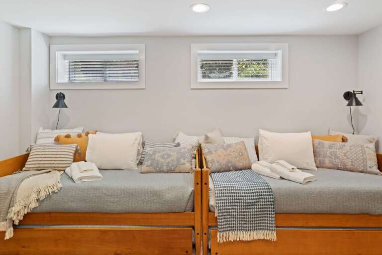 Basement Bedroom with Four Twin Beds
