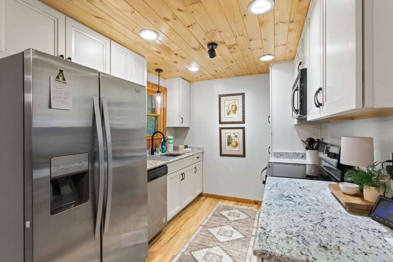 Granite Countertops and Tongue-and-Groove Ceiling in the Kitchen Granite Countertops and Tongue-and-Groove Ceiling in the Kitchen