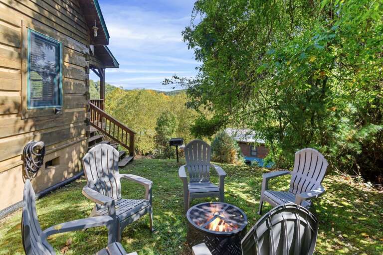 Spacious Backyard with Wood Burning Fire Pit and Charcoal Grill Spacious Backyard with Wood Burning Fire Pit and Charcoal Grill