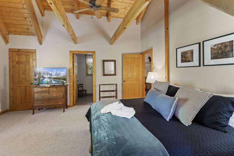 TV (now mounted) and Jack-and-Jill Bathroom in the Upper Level King Bedroom