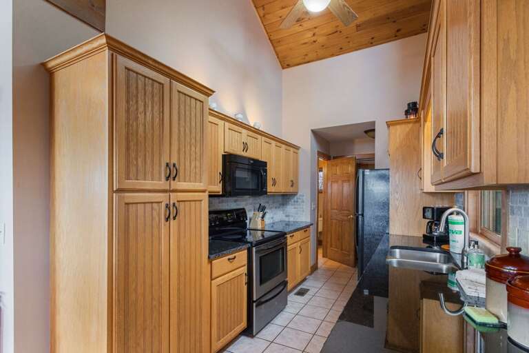 Galley Style Kitchen with New Granite Counters