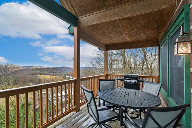 Gas Grill and Outdoor Dining on the Main Level Deck with Mountain Views