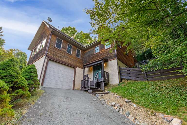 Steep Paved Driveway with Parking in the Garage and Driveway