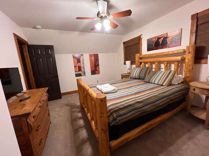 Upper Level Bedroom with Queen Bed and TV