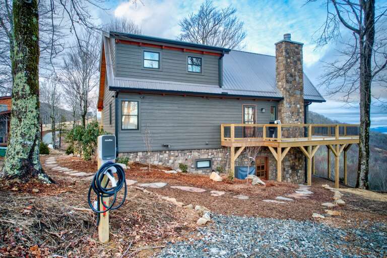 EV Charging Station in the Driveway (Please New Stairs Have Been Built to Access this side of the Deck from the Driveway) EV Charging Station in the Driveway (Please New Stairs Have Been Built to Access this side of the Deck from the Driveway)