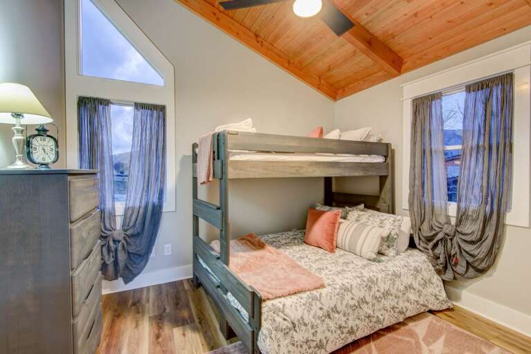Upper Level Bedroom with an XL Twin-Over-Queen Bunk Bed Upper Level Bedroom with an XL Twin-Over-Queen Bunk Bed