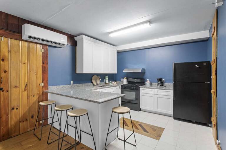 Lower Level Kitchen with Bar Seating