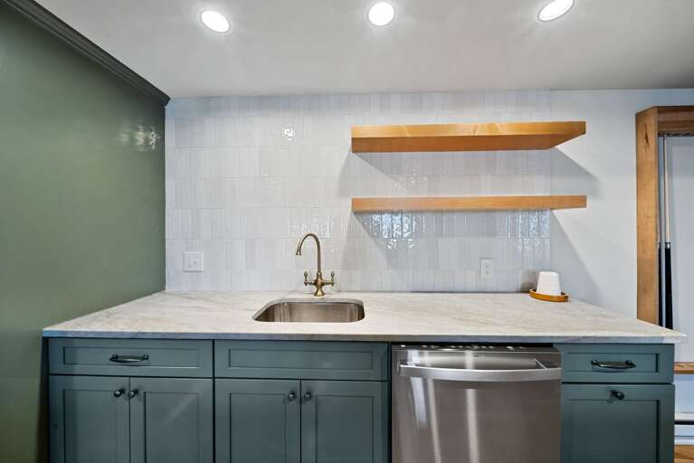 Full Fridge, Sink and Dishwasher in the Lower Level Makes Game Time Snacks a Breeze