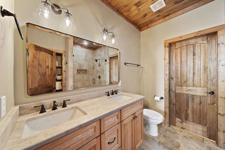 Master Bathroom with Double Vanities and Step-In Shower