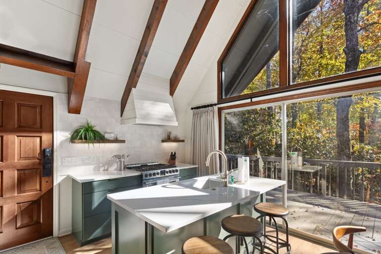 Custom Kitchen with Quartz Countertops and Dining for Three as the Island Custom Kitchen with Quartz Countertops and Dining for Three as the Island