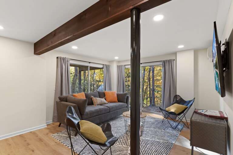 Lower Level Den with Smart TV and Queen Sleeper Sofa Lower Level Den with Smart TV and Queen Sleeper Sofa