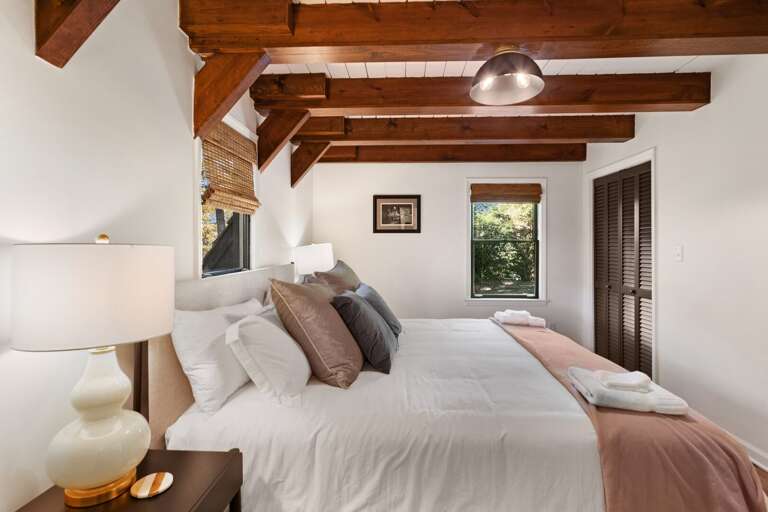 Main Floor Master Bedroom with King Bed and Ensuite Main Floor Master Bedroom with King Bed and Ensuite