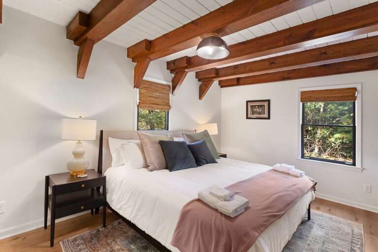 Main Floor Master Bedroom with Tongue-and-Groove Ceilings and Custom Beams Main Floor Master Bedroom with Tongue-and-Groove Ceilings and Custom Beams