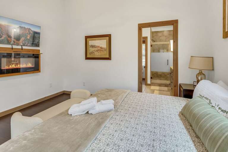 Main Floor Master Bedroom with TV and Electric Fireplace Main Floor Master Bedroom with TV and Electric Fireplace