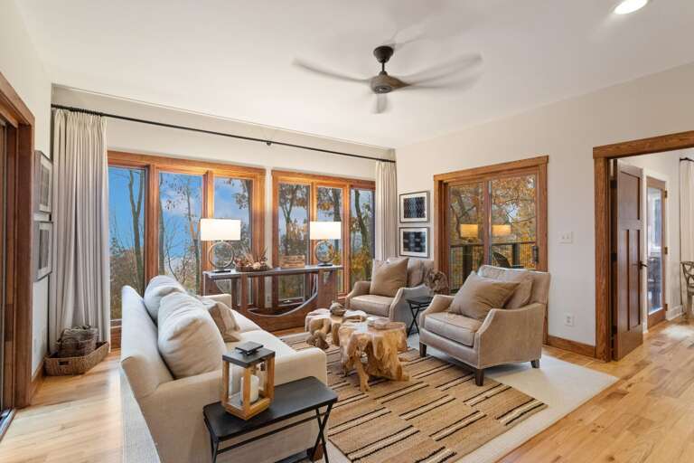 Comfortable Lounging Area on the Main Floor with Access to the Deck