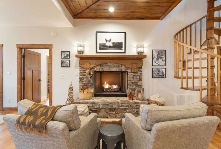 Main Level Cozy Sitting Area by the Gas Fireplace
