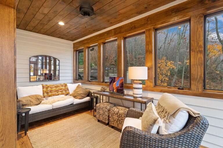 Sun Room with a TV and Deck Access