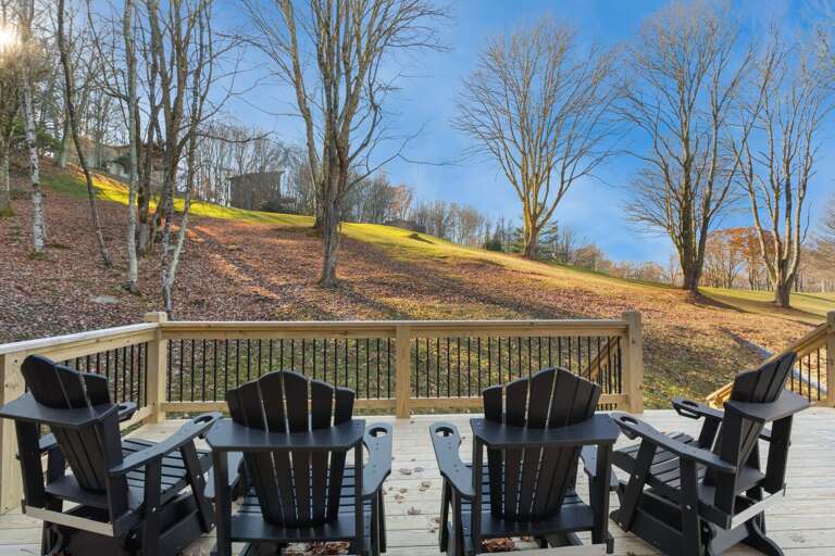 Adirondack Deck Chairs Overlooking the Golf Course Adirondack Deck Chairs Overlooking the Golf Course