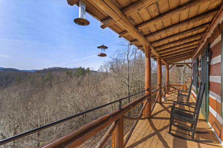 Covered Porch with Rocking Chairs to Enjoy The Views