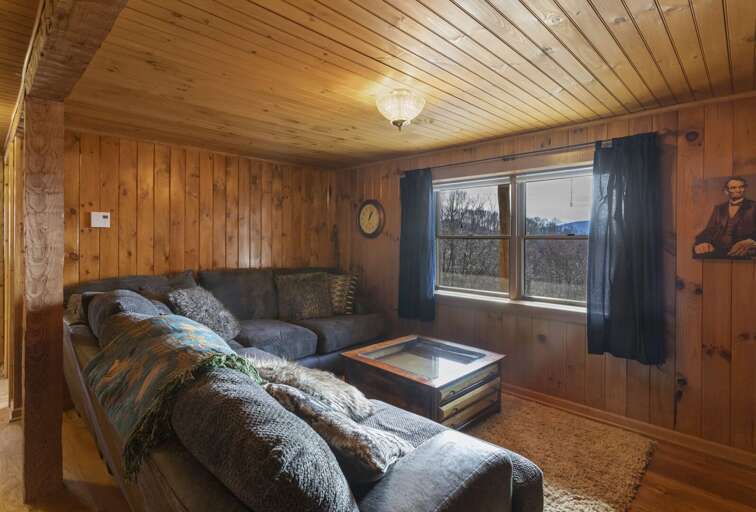 Sectional with Queen Sleeper Sofa in the Lower Level Den