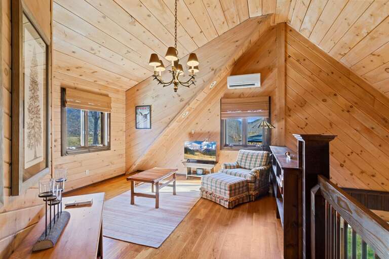 Loft Sitting Area with TV and Now has a Double Sleeper Sofa