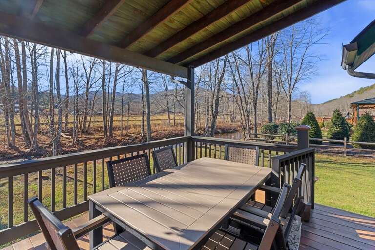 Riverside Outdoor Dining Table on the Covered Deck