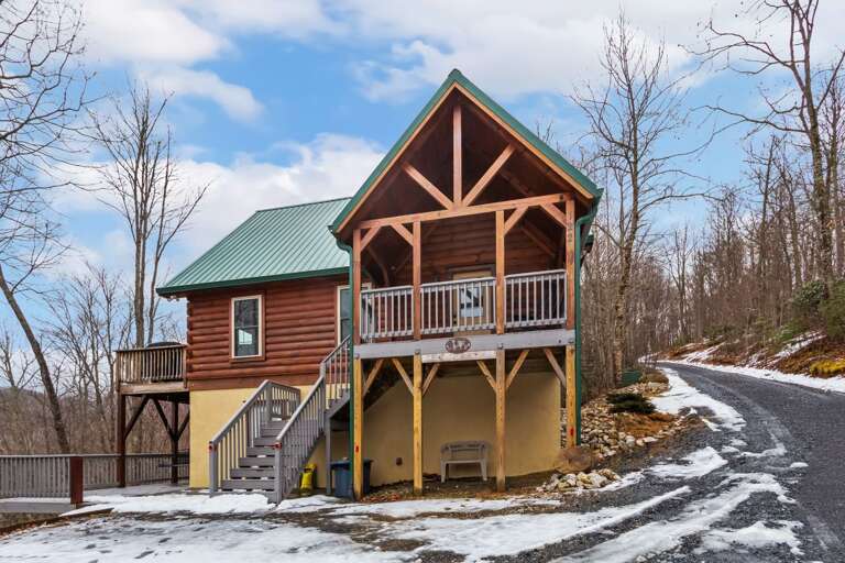 Level Gravel Parking and Gravel Driveway and Stairway to the Main Covered Front Entrance