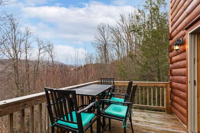 Outdoor Table and Chairs on the Main Level Deck
