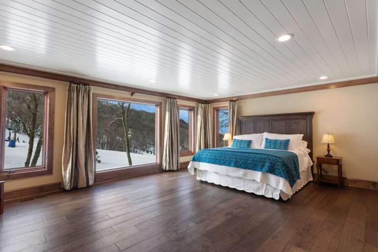Huge Master Bedroom on the Main Floor with Big View of the Slopes