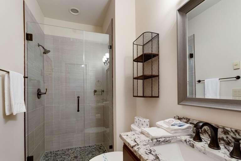Bathroom in the Office with Tiled Step in Shower Bathroom in the Office with Tiled Step in Shower