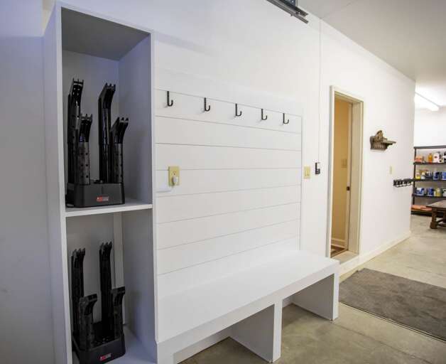 Boot Bench with Coat Hooks and Boot Warmers with a Ski Rack to the Right Boot Bench with Coat Hooks and Boot Warmers with a Ski Rack to the Right