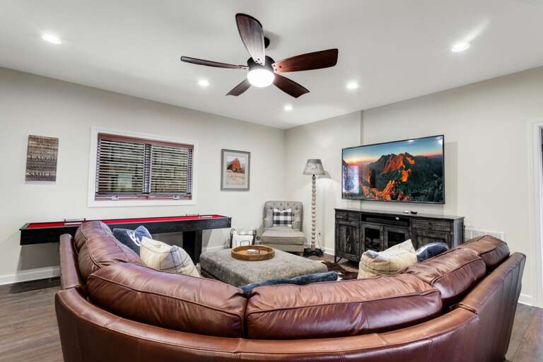 Family Room has a Leather Sectional around the TV Family Room has a Leather Sectional around the TV