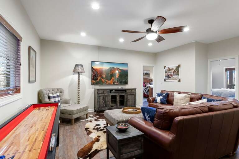 Lower Level Family Room with Shuffleboard Table Lower Level Family Room with Shuffleboard Table