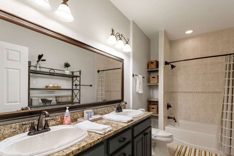 Lower Level Shared Hallway Bathroom Lower Level Shared Hallway Bathroom