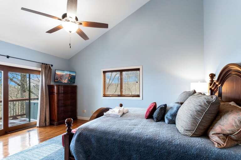 Main Level Master Bedroom with TV and Deck Access Main Level Master Bedroom with TV and Deck Access