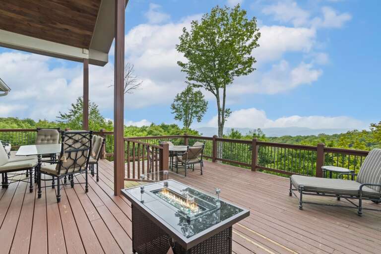 Spacious Main Level Deck Overlooking the Blue Ridge Mountains with a Gas Fire Table Spacious Main Level Deck Overlooking the Blue Ridge Mountains with a Gas Fire Table