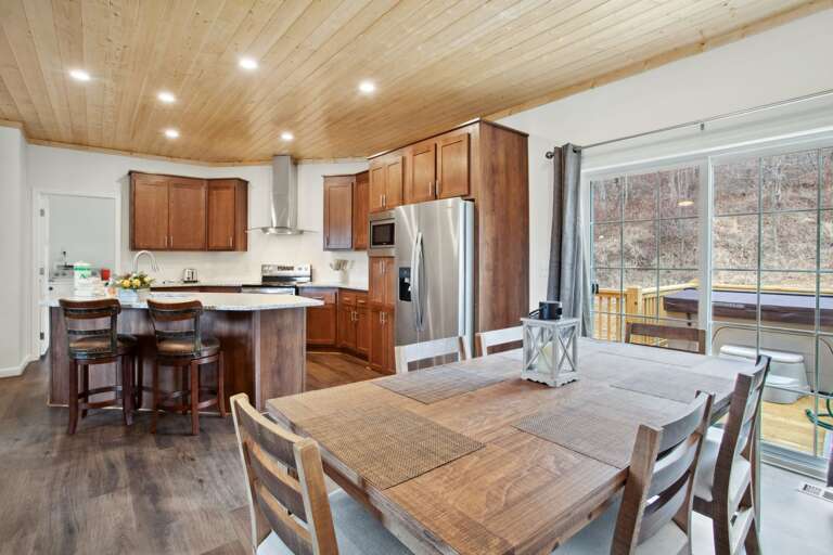 Dining Area with Seating for Six and Access to the Back Deck