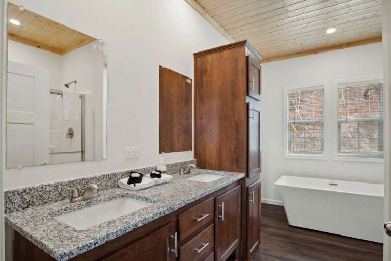 Master Bathroom with Double Vanities and Step-In Shower
